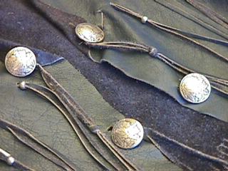 Closeup of Blue Vest with Indianhead nickels